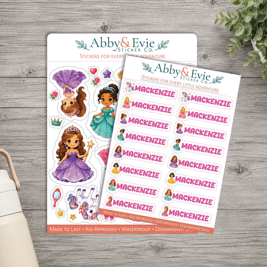 Two sheets of custom fairy tale princess stickers from Abby & Evie Sticker Co. displayed on a gray wood background.