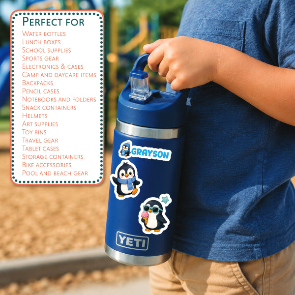 A person outdoors holding a blue YETI insulated water bottle with penguin stickers. A white text box on the left lists product uses such as water bottles, lunch boxes, sports gear, and electronics cases.
