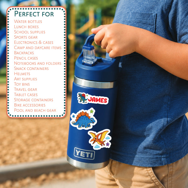 A person outdoors holding a blue YETI water bottle with dinosaur stickers. A white text box on the left lists product uses such as water bottles, lunch boxes, and school supplies.