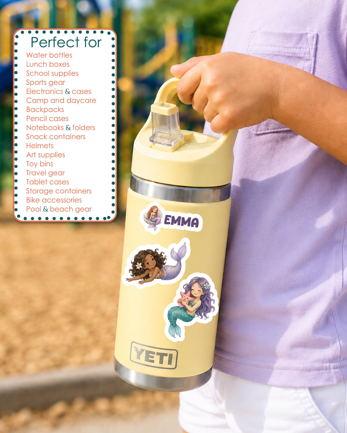 A person in a light purple shirt holds a pale yellow YETI water bottle with a matching lid. The bottle has several colorful mermaid-themed stickers and a silver stainless steel neck and base.